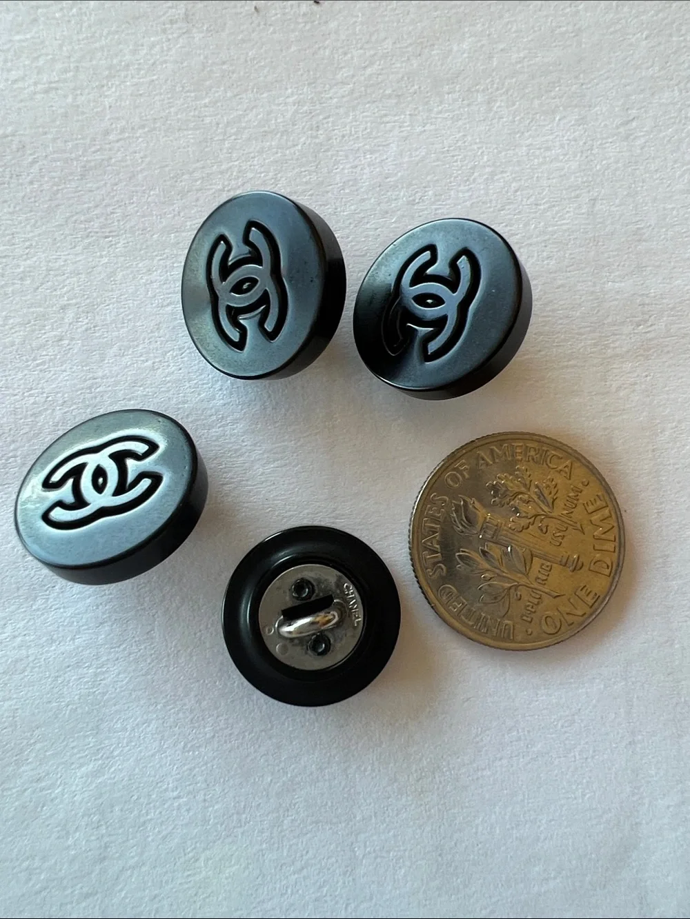 CHANEL Black Round Interlocking CC Cuff Buttons